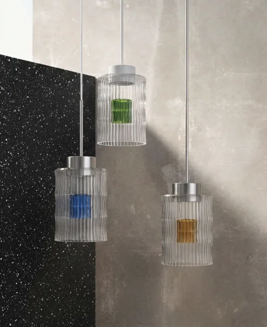 Rendering of three Celina pendants with green, blue and amber inner vases