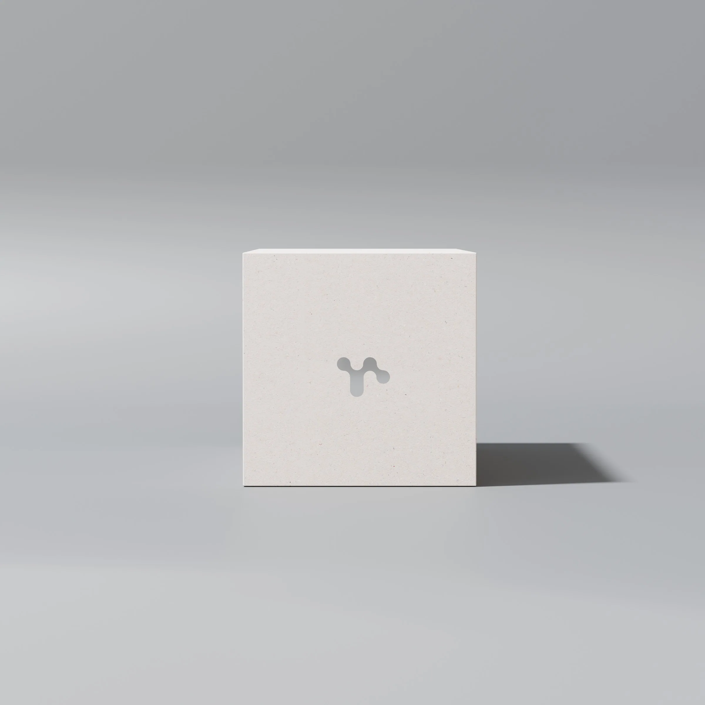 End of a light grey box with the symbol cut out
